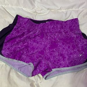 Nike purple athletic shorts. never worn. no stains